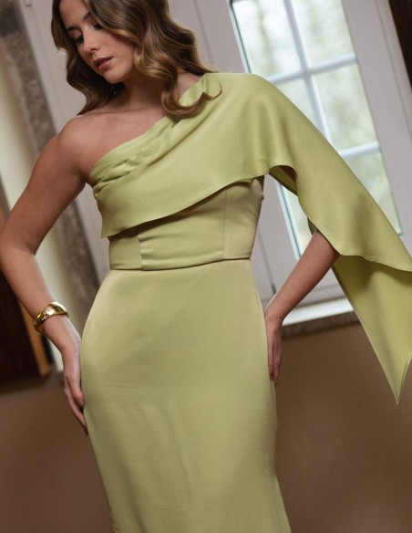 Long green party dress with asymmetrical neckline