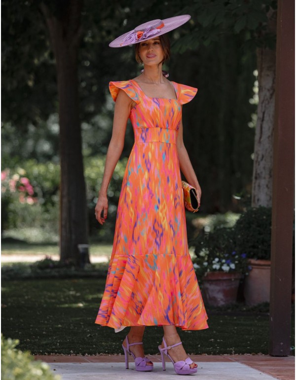 Vestido de invitada midi en lino estampado en naranja