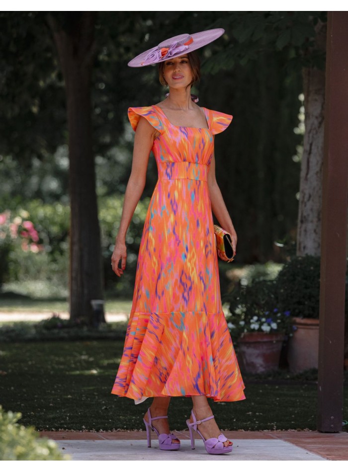 Vestido de invitada midi en lino estampado en naranja