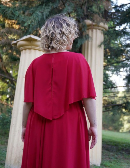 Long guest dress with brooch and cape