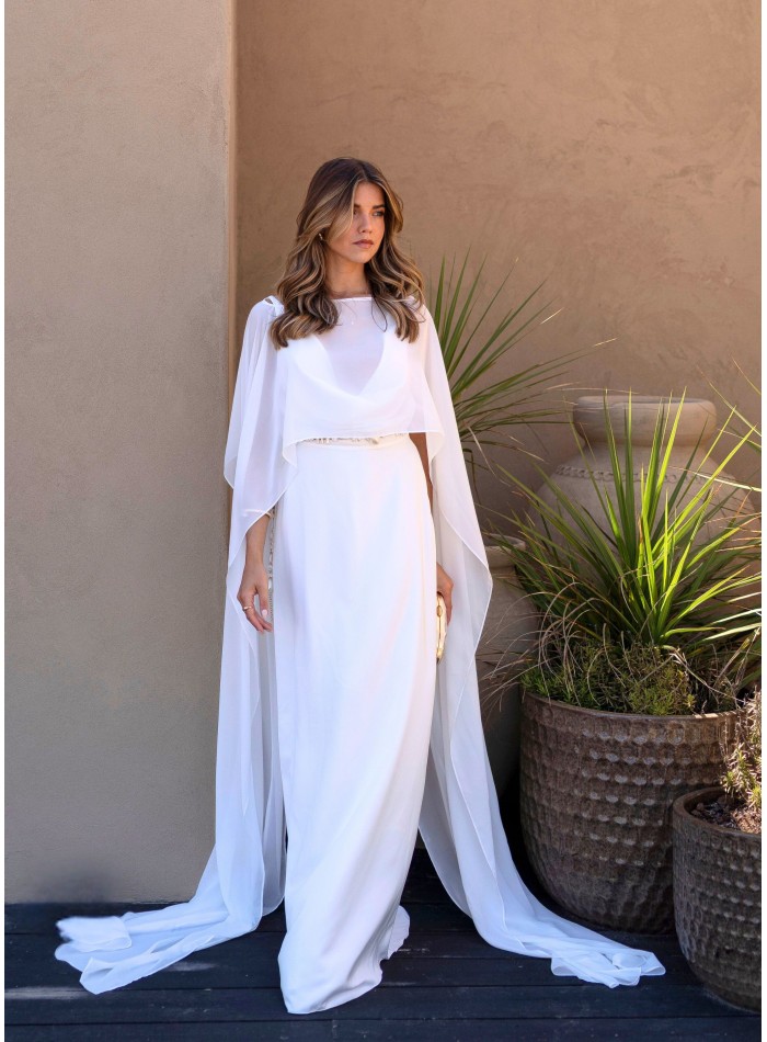 Long white dress with plunging neckline
