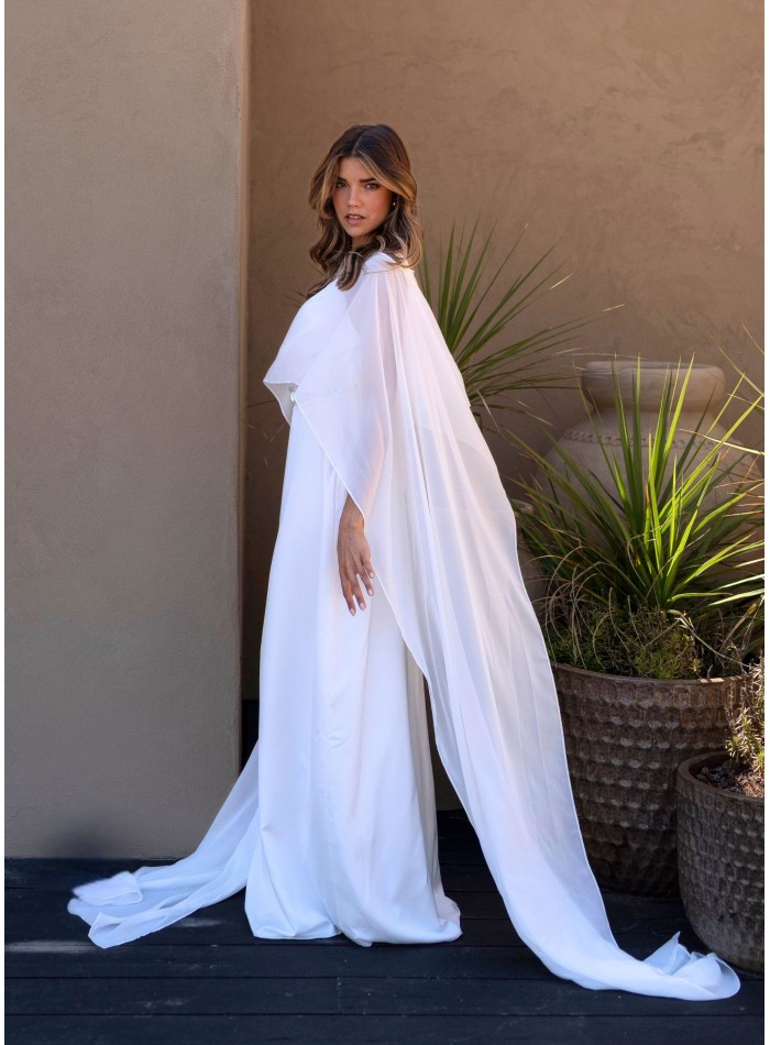 Long white dress with plunging neckline