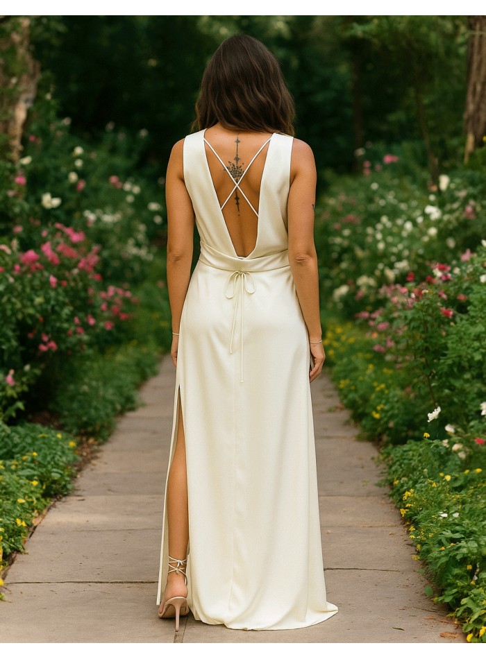 Long white satin gown with open back and slit
