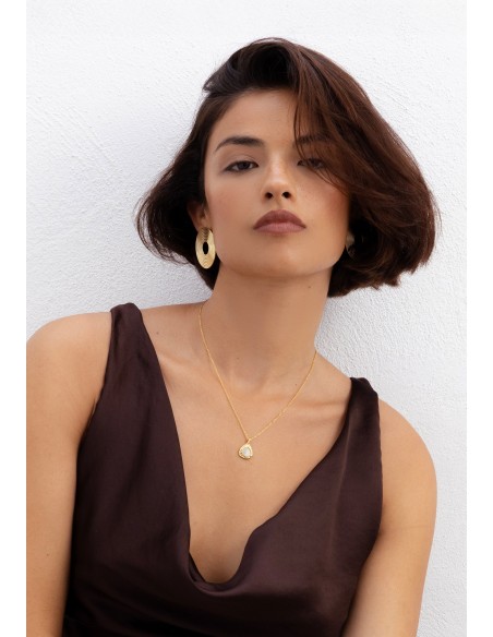 Long golden pendant with moonstone