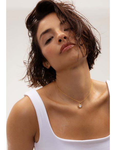 Long golden pendant with moonstone