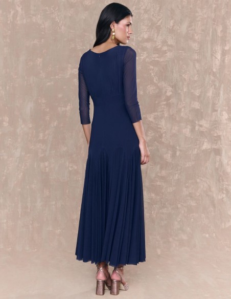 Navy blue midi guest dress with crossover neckline and flounce skirt
