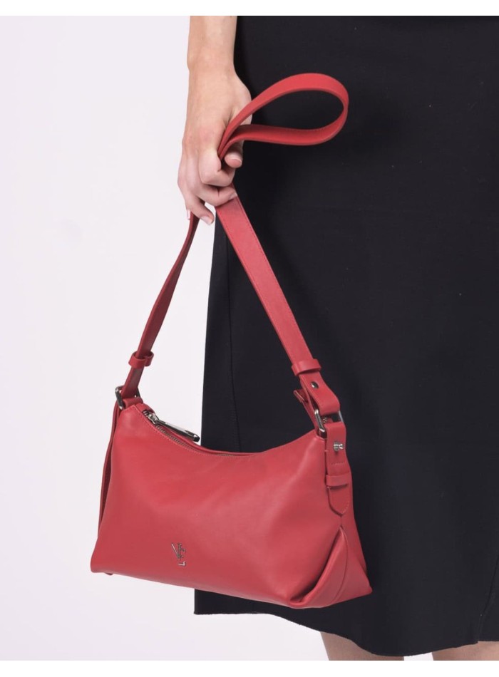 Leather handbag with adjustable handle and knot