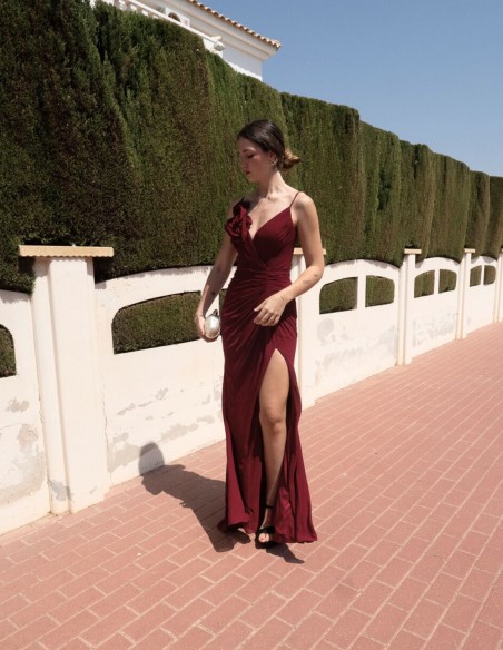 Long gown with V-neckline and flower detail on the strap