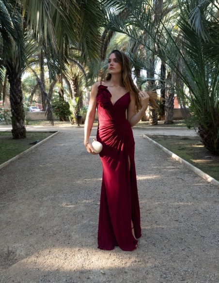 Long gown with V-neckline and flower detail on the strap