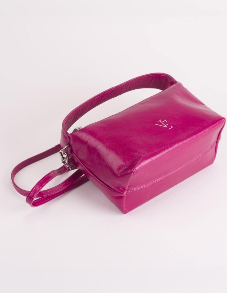 Leather bag with fixed handle and adjustable strap