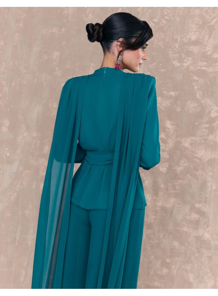 Draped blouse with petroleum colored waist belt