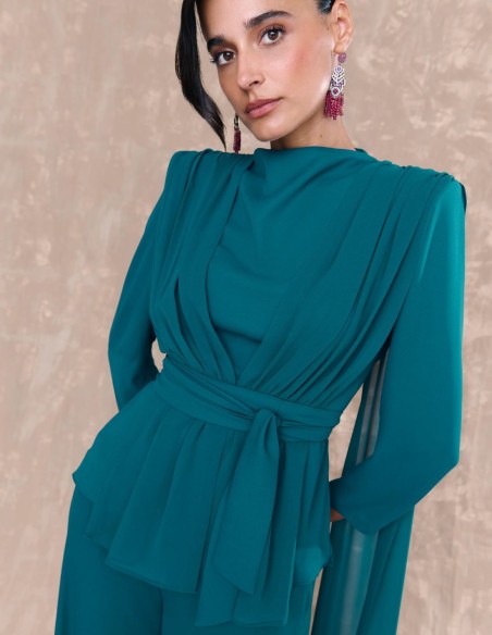 Draped blouse with petroleum colored waist belt