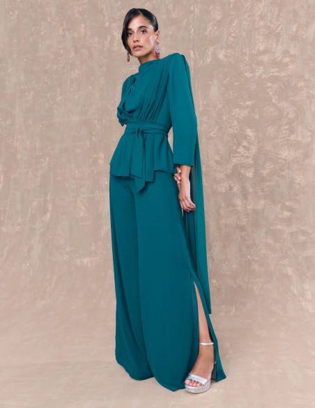 Draped blouse with petroleum colored waist belt