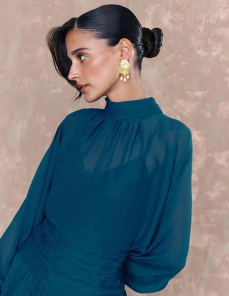 Short dress in blue chiffon with draped sash and ruffles