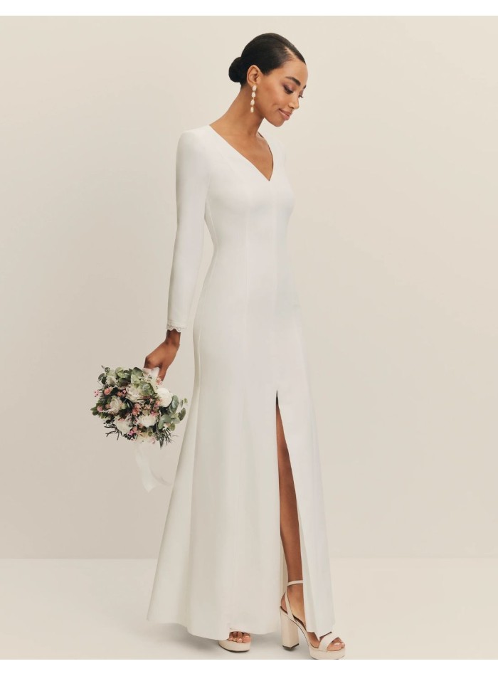 Long wedding dress with V-neckline and shoulder...