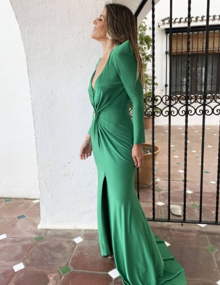 Long knitted dress with shoulder pads and crossover neckline