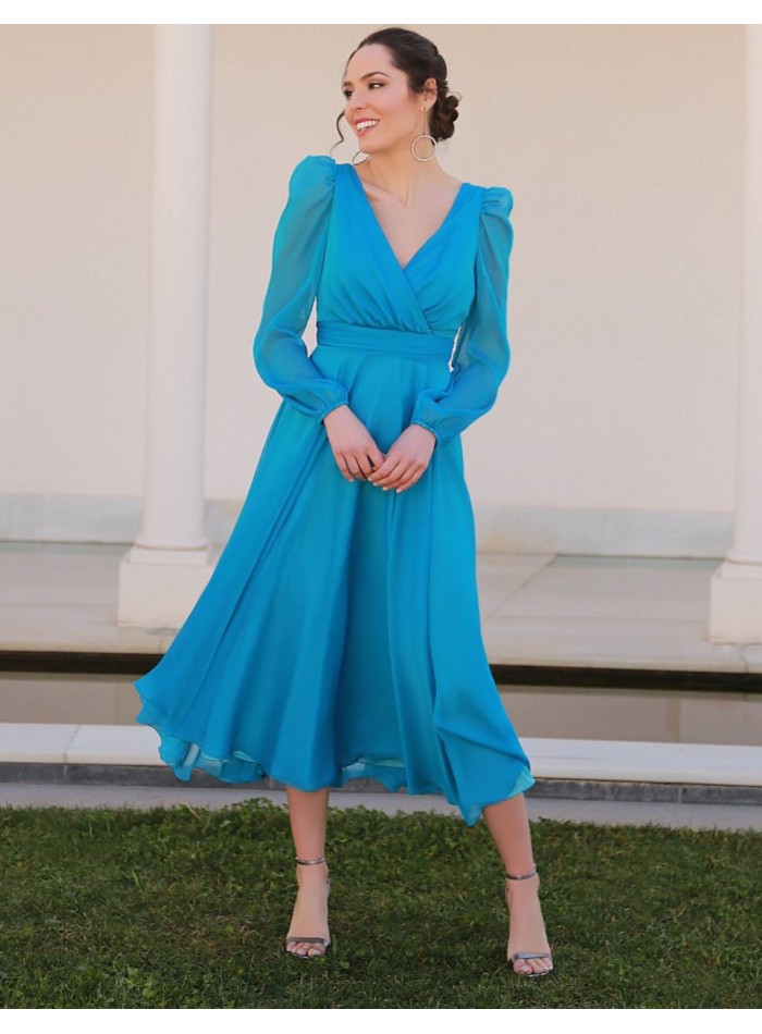 Vestido midi con manga larga y espalda abierta