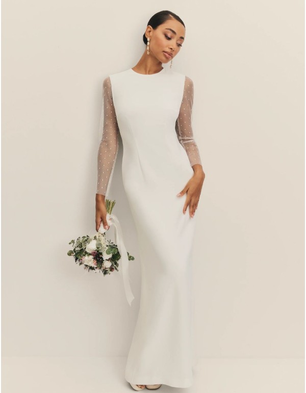 Long wedding dress with closed neckline and plumeti sleeves