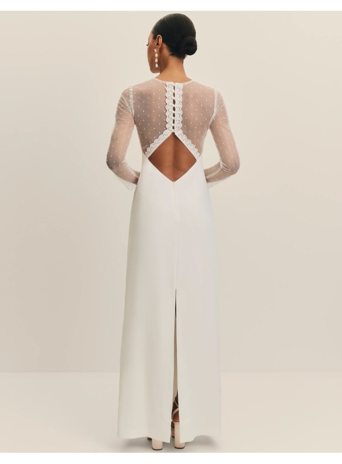 Long wedding dress with closed neckline and...
