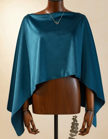 Fine velvet cape with slits in petroleum blue color