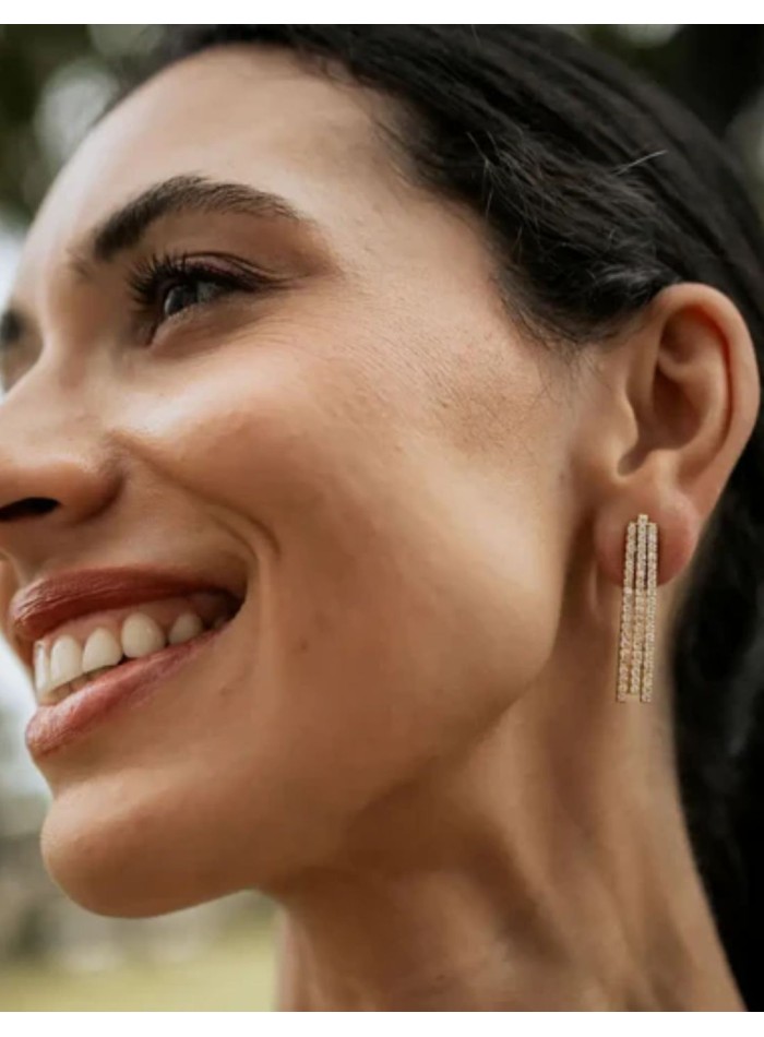 Earrings with three rows of zircons