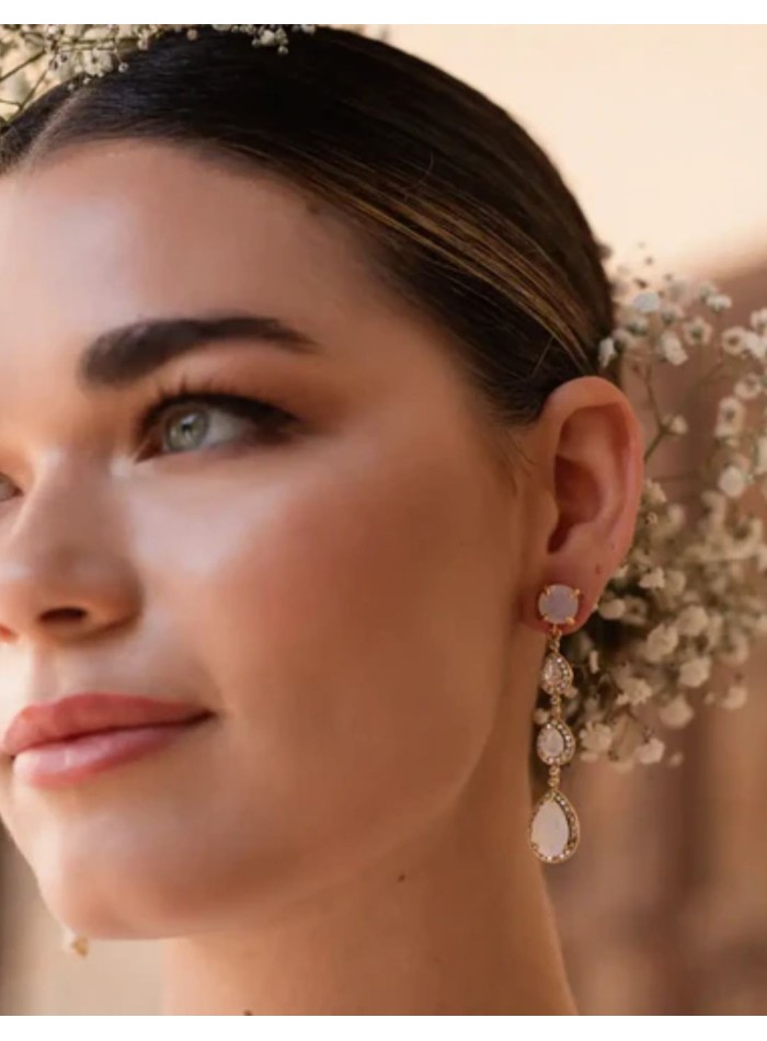 Teardrop earrings with faceted stones and zircons