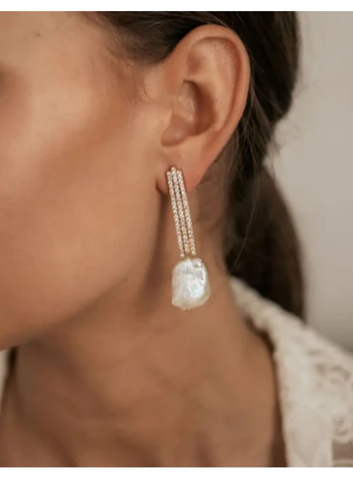 Boucles d'oreilles avec rangées de zircons...