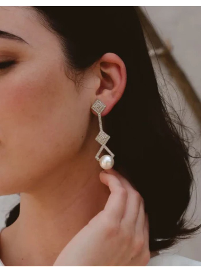 Sterling silver earrings in geometric shapes...