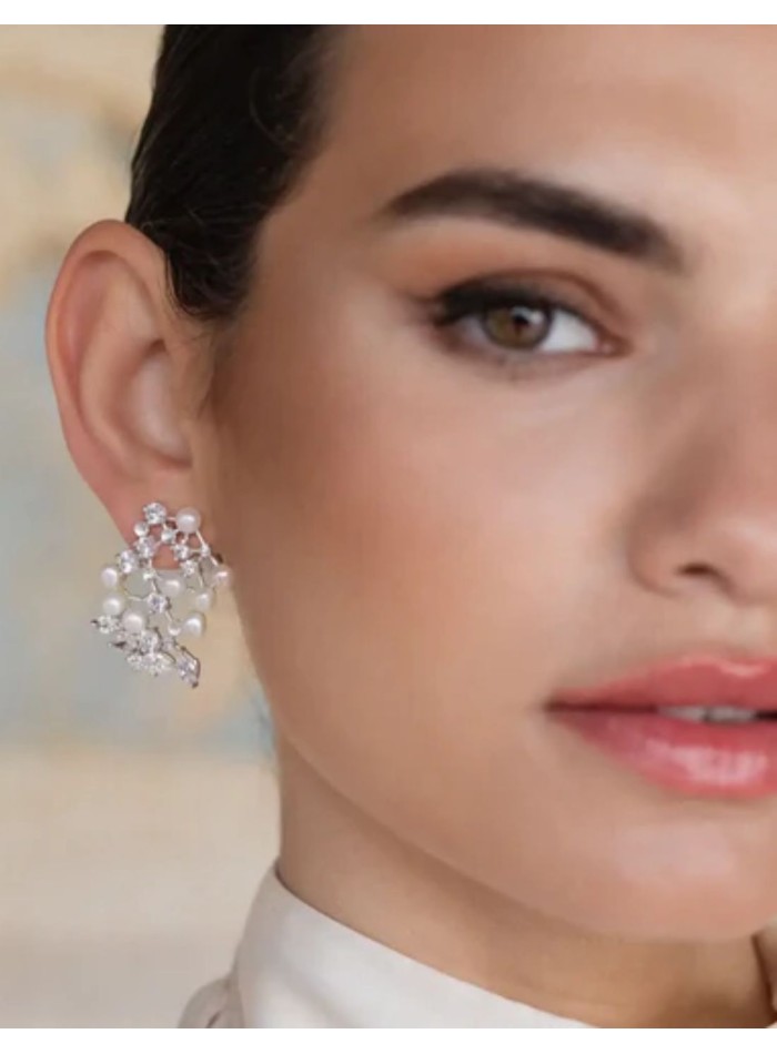 Sterling silver pearl earrings with zirconia...