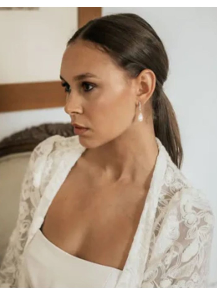 Longues boucles d'oreilles avec une rangée de...