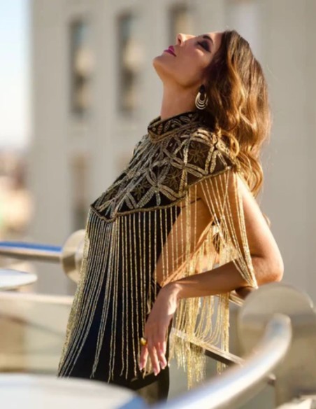 Jeweled cape with geometric embroidery and flowing drape