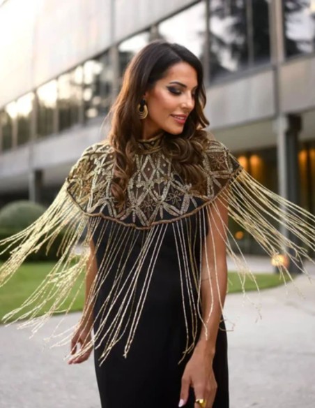 Jeweled cape with geometric embroidery and flowing drape