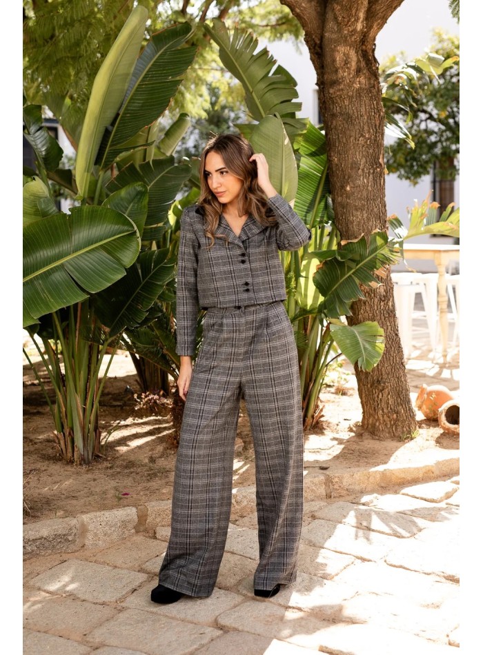 Pantalon long à carreaux gris et noirs