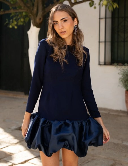 Short dress with ruffle skirt and open back