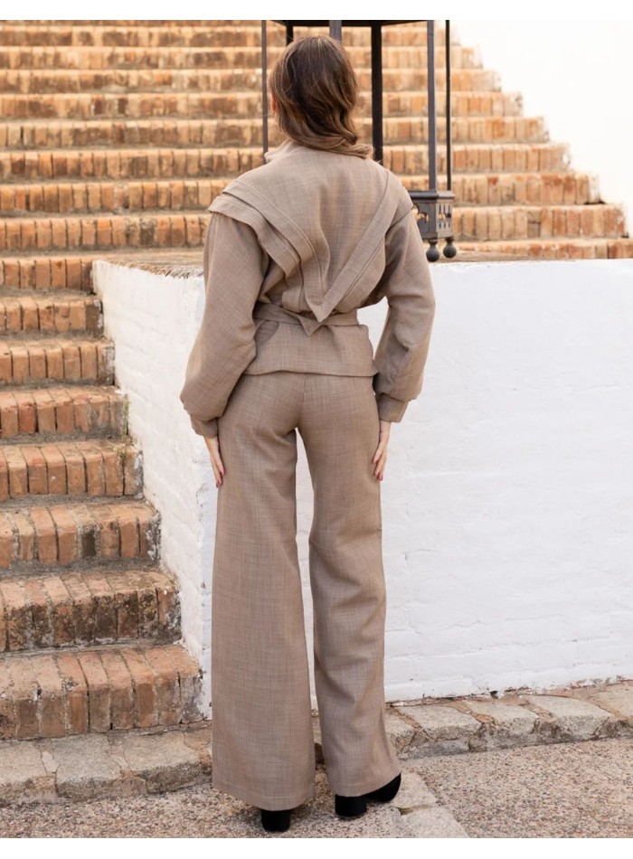 Beige jacket with bat sleeves