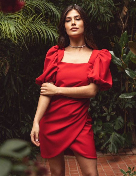 Short red dress with square neckline and draped skirt