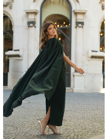 Green long dress with asymmetrical neckline and cape sleeves
