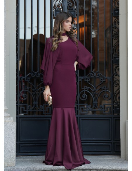 Long burgundy mermaid cut dress with asymmetrical neckline and cape