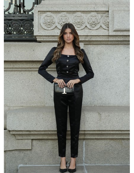 Pantalón de tiro alto negro elegante con bolsillos laterales y cierre invisible para eventos especiales