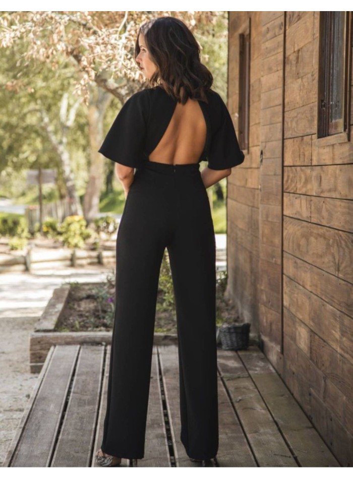 Black long jumpsuit with crossed neckline and...