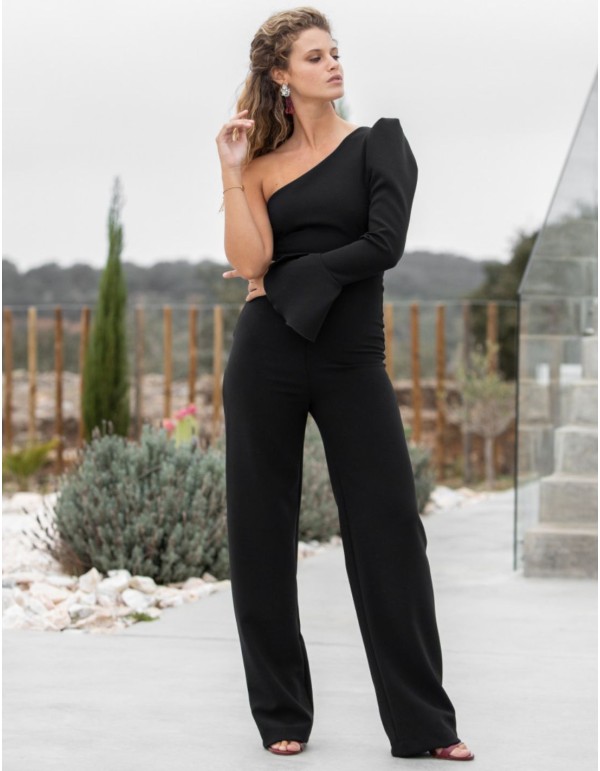 Black party jumpsuit with asymmetric neckline and flounce
