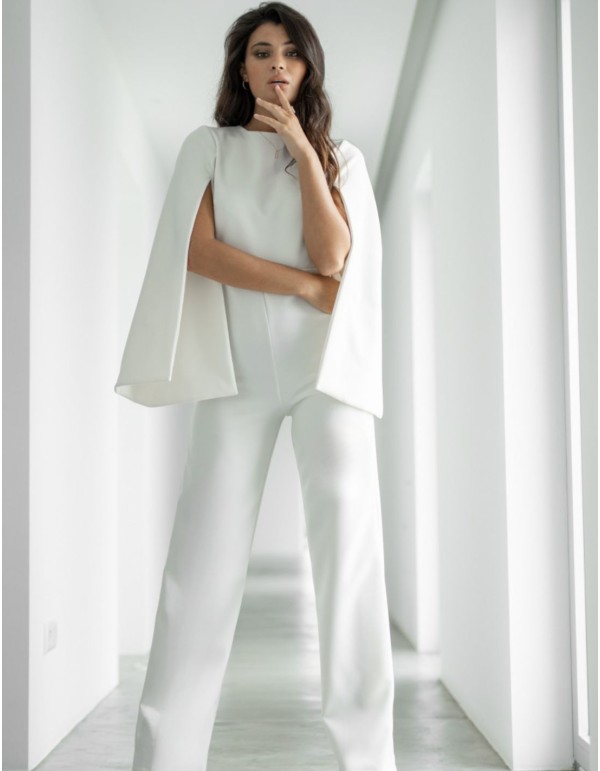 White jumpsuit with puffed sleeves and open back