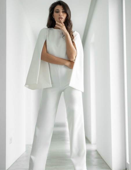 White jumpsuit with puffed sleeves and open back