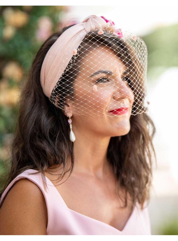 Pink knotted headband with preserved flowers