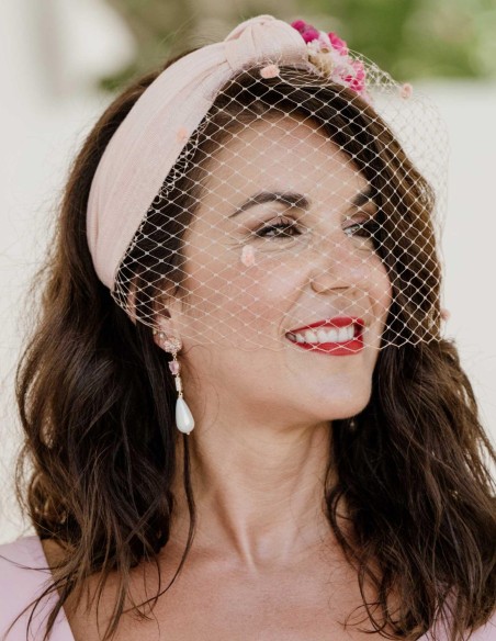 Pink knotted headband with preserved flowers