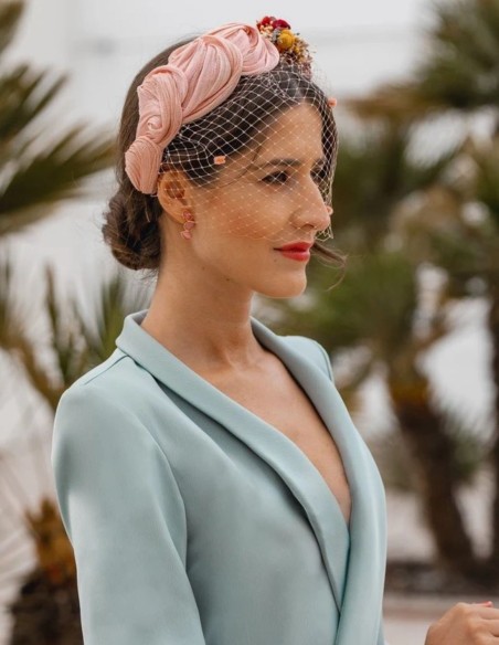 Ruffled party headband with knots and floral side trimming