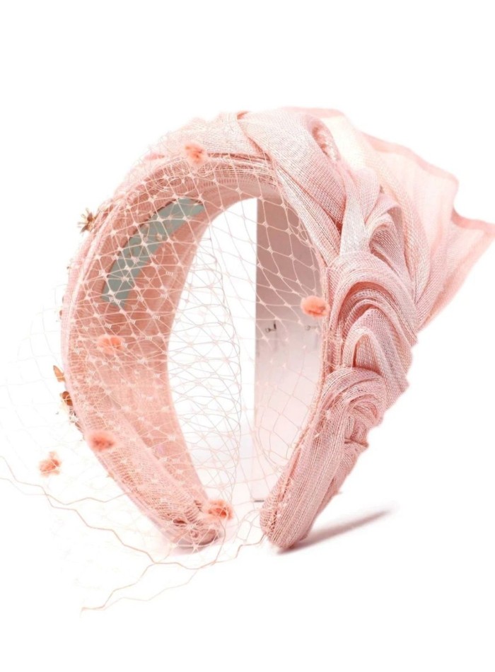 Ruffled pink guest headband with jewelry and...