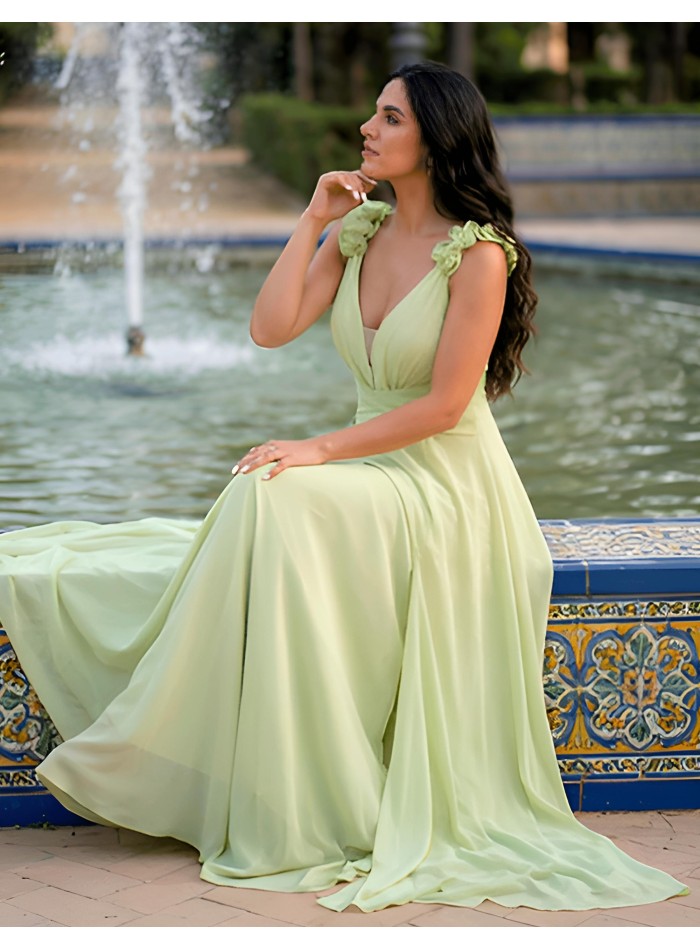 Long wedding guest dress with V-neckline and...