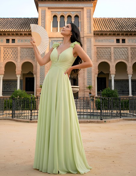 Long wedding guest dress with V-neckline and floral straps