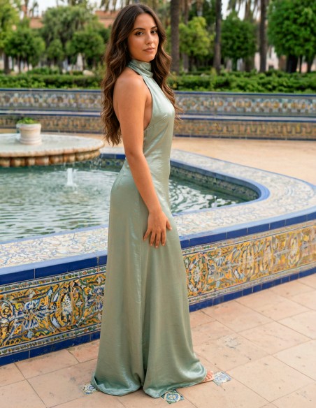 Pastel green satin graduation dress with halter neckline and open back